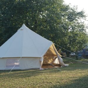 Large custom canvas tent in an outdoor setting
