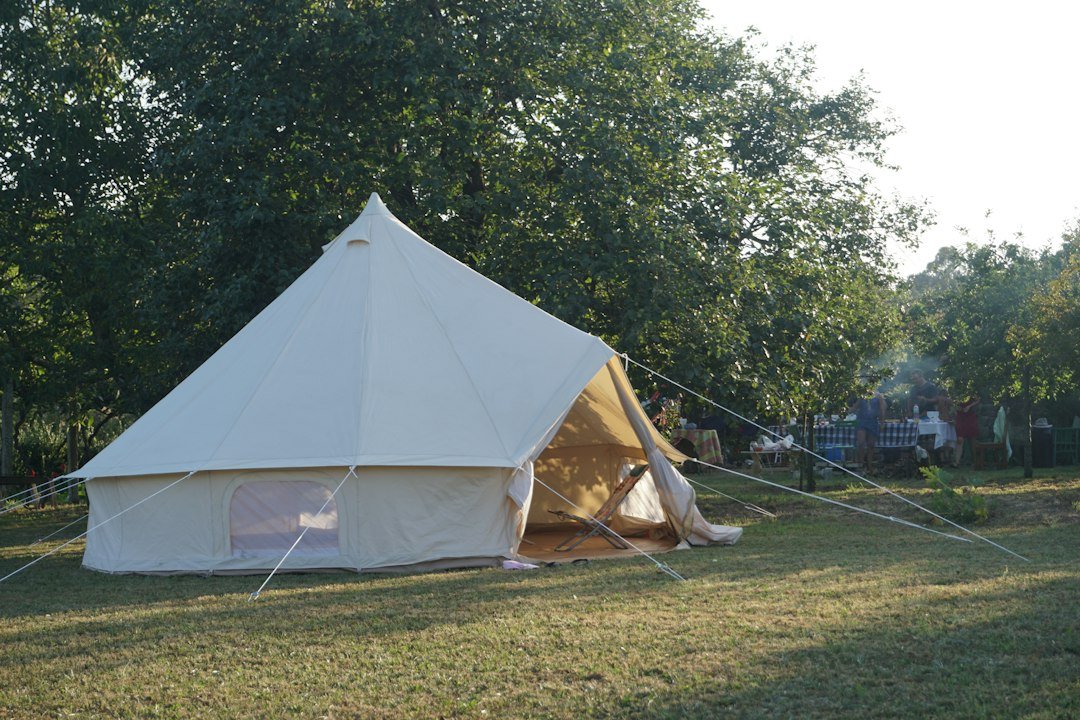 Large custom canvas tent in an outdoor setting